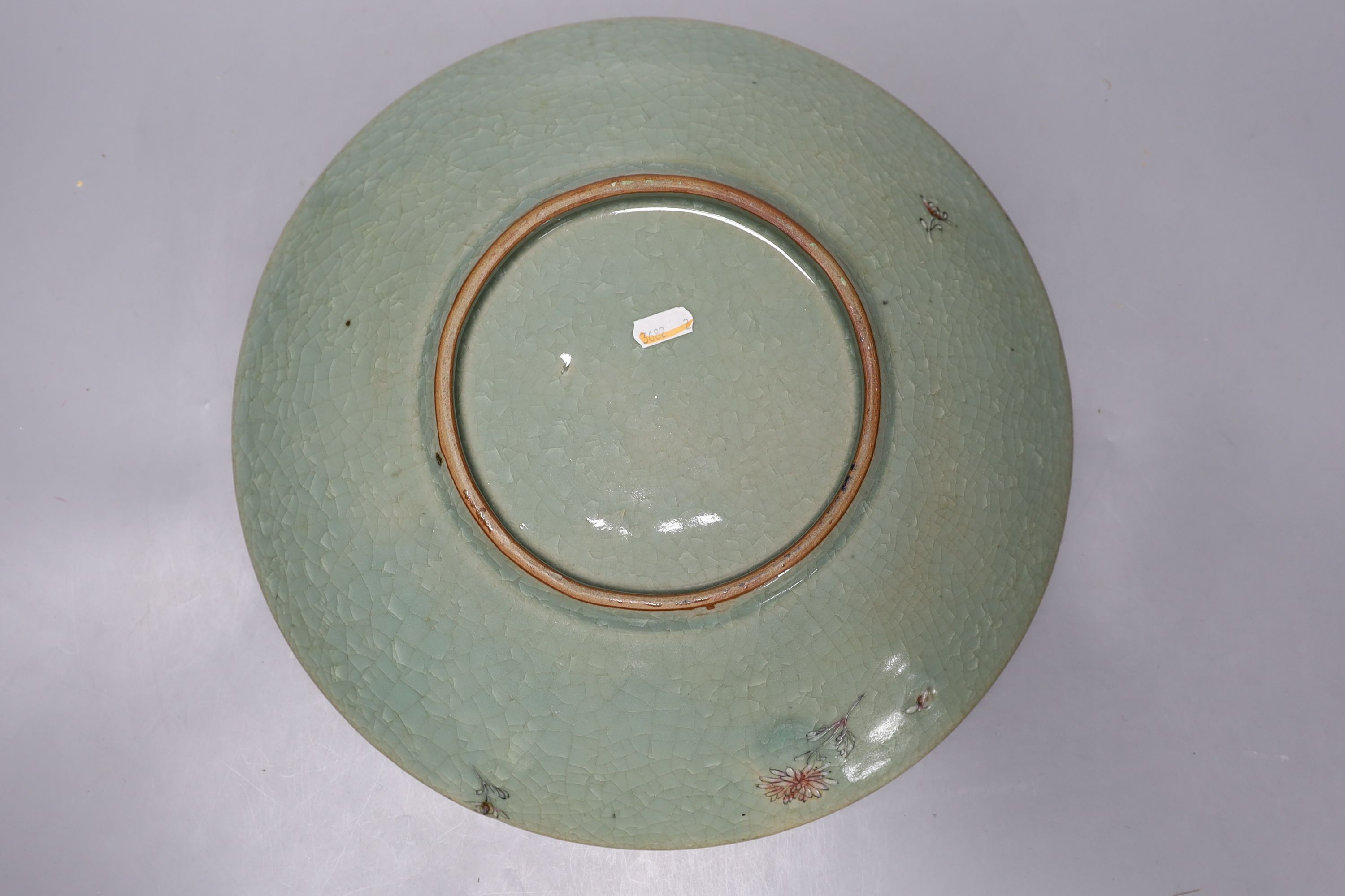 A pair of Japanese pottery moriage celadon ground dishes, early 20th century, 38cm